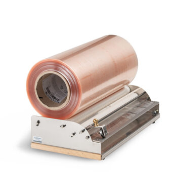 Professional film dispenser with stainless steel cutter